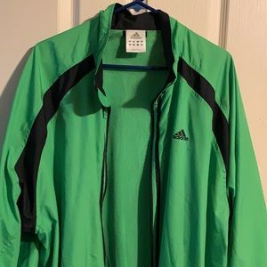 Green adidas windbreaker.  . Plus a sleeveless shirt that goes with the jacket